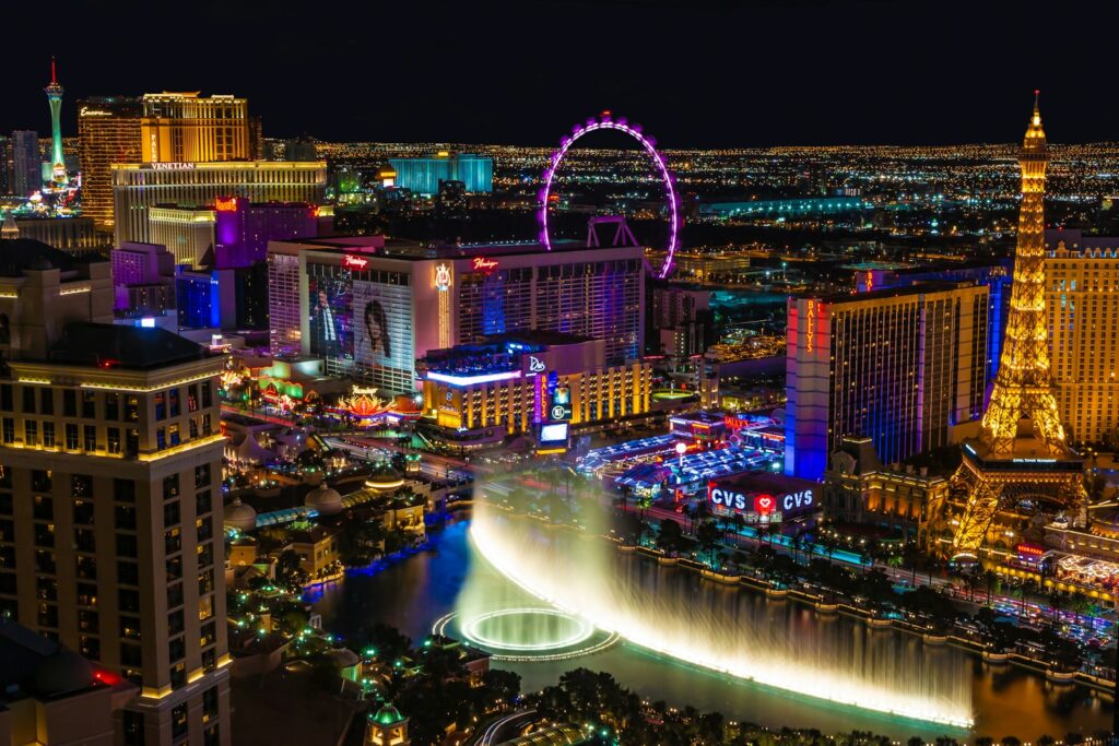 Las Vegas Strip aerial view at sunset showing hotels and city lights
