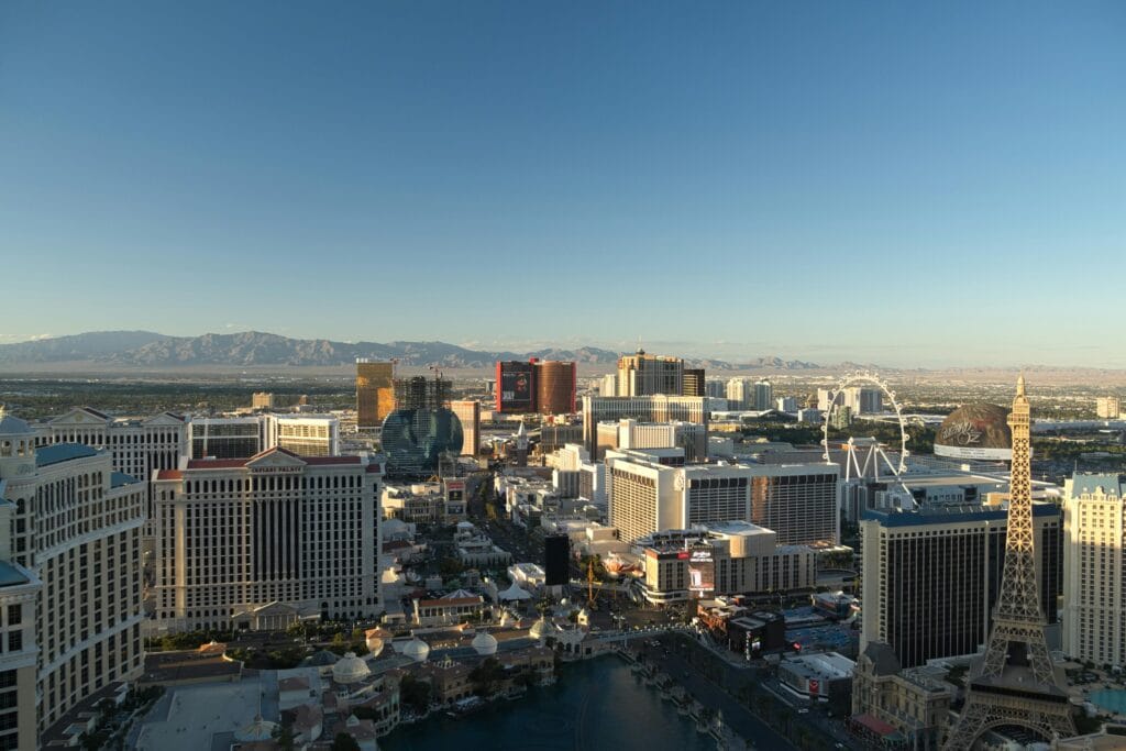 Panoramic daytime aerial view of Las Vegas Strip showing Bellagio, Paris Las Vegas Eiffel Tower and High Roller wheel