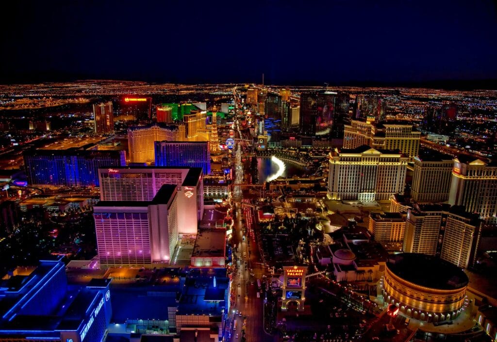 Aerial view of the Las Vegas Strip at night illuminated by hotel and casino lights