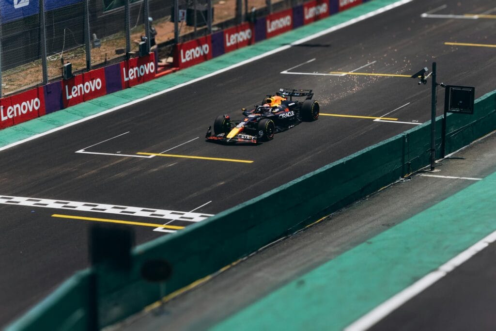 Formula 1 race car on track at high speed